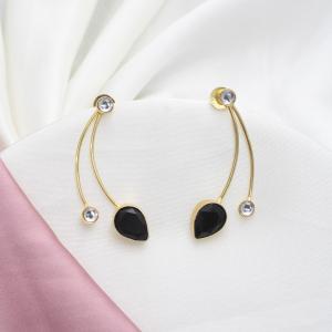Boucles d’oreilles dorées modernes avec pierres transparentes