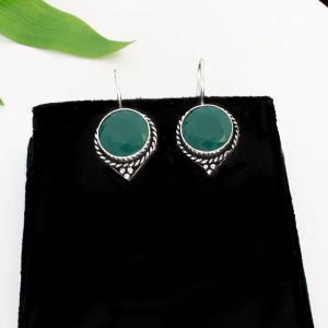 Boucles d’oreilles argenté aux pierres verte