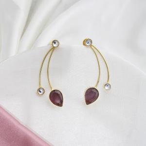 Boucles d’oreilles dorées modernes avec pierres transparentes