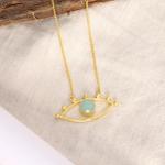 Collier doré avec pendentif œil – protection