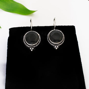 Boucles d’oreilles argenté aux pierres verte