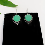 Boucles d’oreilles argenté aux pierres verte